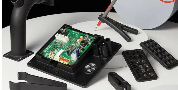 Electronics assembly station with antistatic tools (jigs and fixtures) printed in 3D from ESD resin, including a PCB holder.