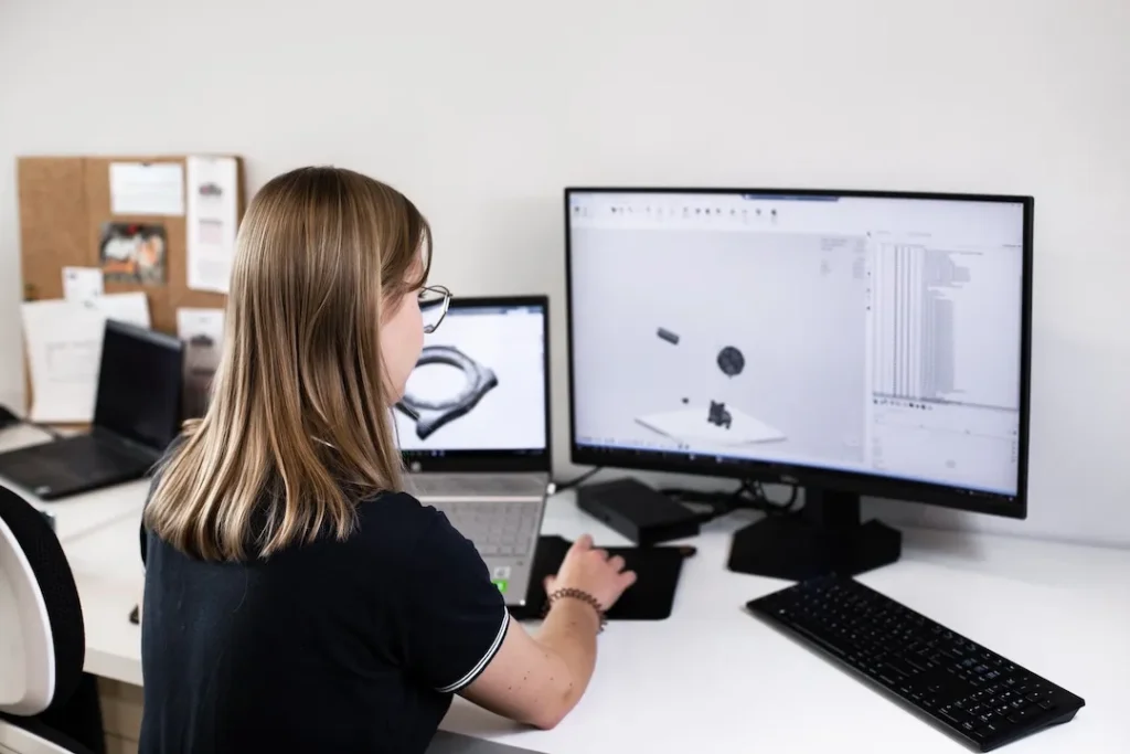 Spes3D specialist preparing a 3D project for printing in the 3D printing laboratory.