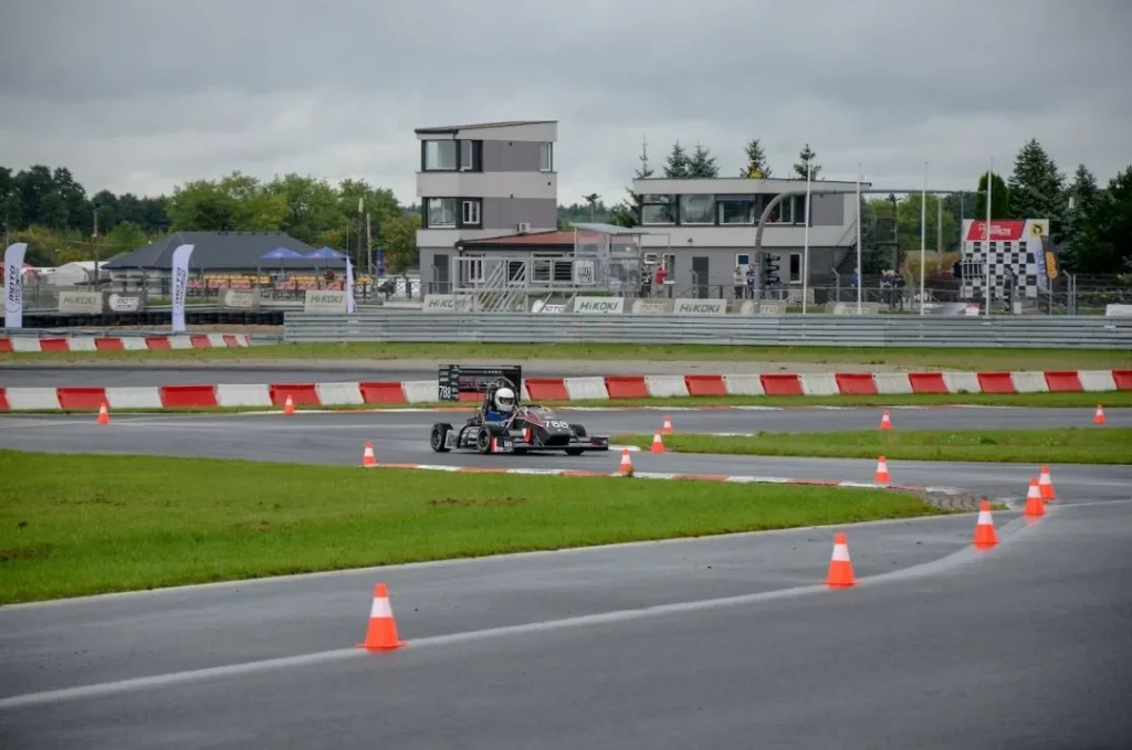 Racing car with 3D printed parts during a track run – project by Spes3D Wrocław.