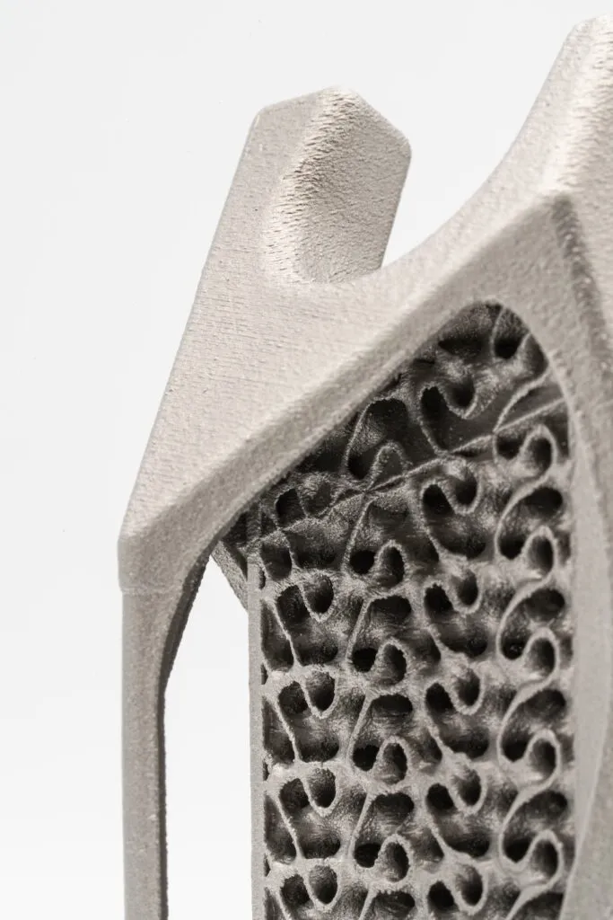 Close-up view of the internal structure of a fuel line gauge made using metal 3D printing technology (LPBF).