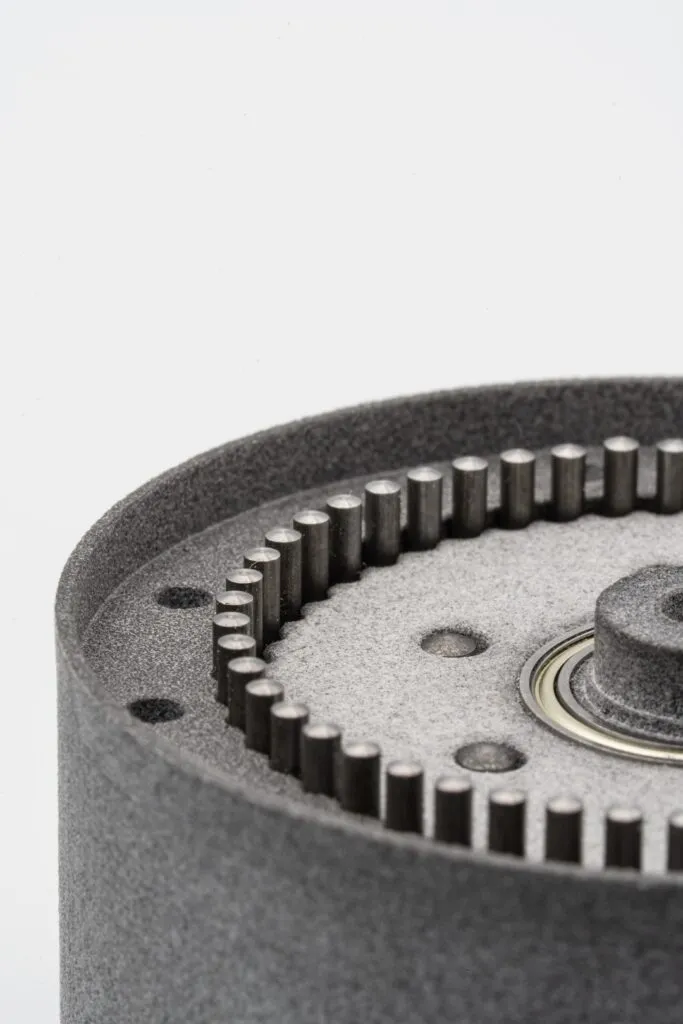 Complex mechanical component with bearings – MJF 3D print from PA12 polyamide integrated with off-the-shelf parts.